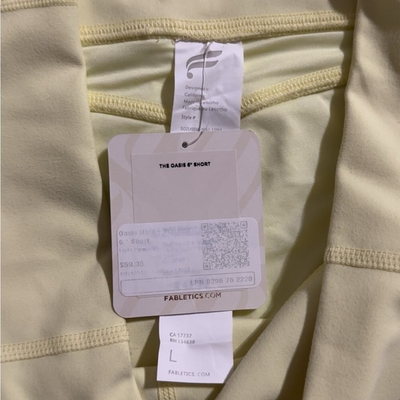 Fabletics Pure Luxe High Waisted Pastel Yellow Bike Shorts 6” - Picture 6 of 6